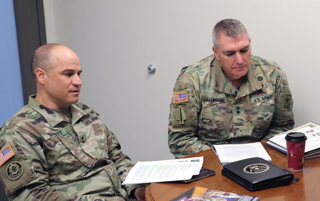  Maj. Gen. David Bassett, USA (l), and Maj. Gen. Peter Gallagher, USA, are working closely together to harness the service’s new cross-functional teams to drive innovation. Photo Credit: Bridget Lynch, PEO C3T