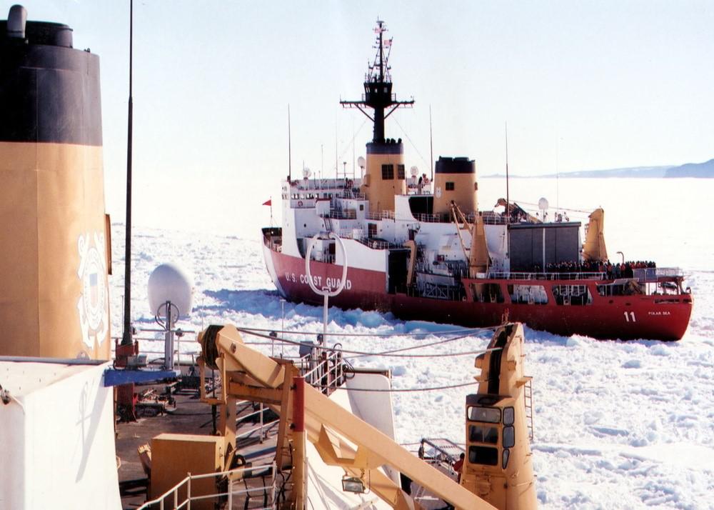 The Coast Guard’s Cyber Command protections have to cover the service’s operations and assets across the globe, even in the polar regions of the Arctic and Antarctica. Pictured is the Coast Guard Ice Breaker Polar Sea passing the Coast Guard Ice Breaker Polar Star in the ice channel near McMurdo, Antarctica. Credit: USCG photo by Rob Rothway
