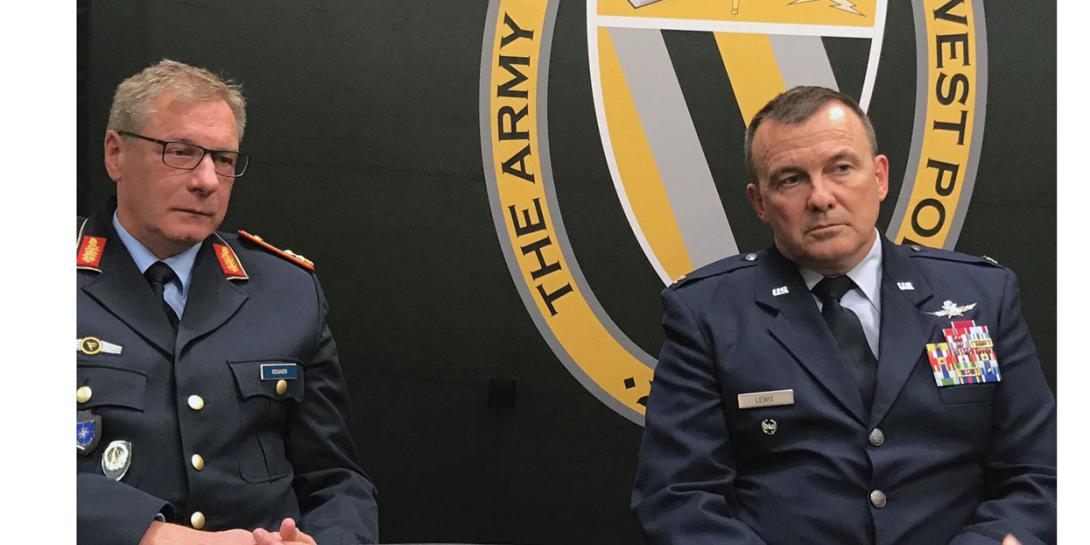Maj. Gen. Wolfgang Renner (l), GEAF, commander, NATO CIS Group and deputy chief of staff cyberspace, SHAPE, and Col. Donald Lewis, USAF, deputy director, NATO CyOC, discuss the establishment of the alliance’s cyber operations at the CyCon U.S. conference in November 2018.