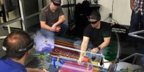 Using the ProtoSpace augmented reality platform and Microsoft HoloLens headsets, engineers at NASA’s Jet Propulsion Laboratory examine aspects of the Multi-Mission Radioisotope Thermoelectric Generator, which is the Mars 2020 Perseverance Rover’s power source.  NASA/JPL-Caltech