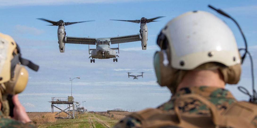 Sgt. Maj. Troy E. Black, USMC, 19th sergeant major of the Marine Corps (r), waits to board an MV-22B assigned to Marine Medium Tiltrotor Squadron (VMM) 162 at Marine Corps Base Camp Lejeune, North Carolina, in January. Maj. Black hosted a Sergeant Major of the Marine Corps Force Level Summit that included a demonstration of the service’s expeditionary advanced base operations concepts. In support of such concepts, the Marine Corps Warfighting Laboratory is positioning itself to provide solutions for Marines