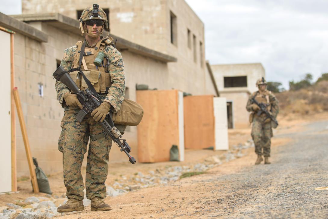 Lance Cpl. Nathan Long, USMC (l), of the 7th Engineer Support Battalion, 1st Marine Logistics Group, participates in a recent mock patrol during a military operation at Camp Pendleton, California. The Marine Corps is facing a changing operating environment and needs appropriate technologies to support urban warfare.