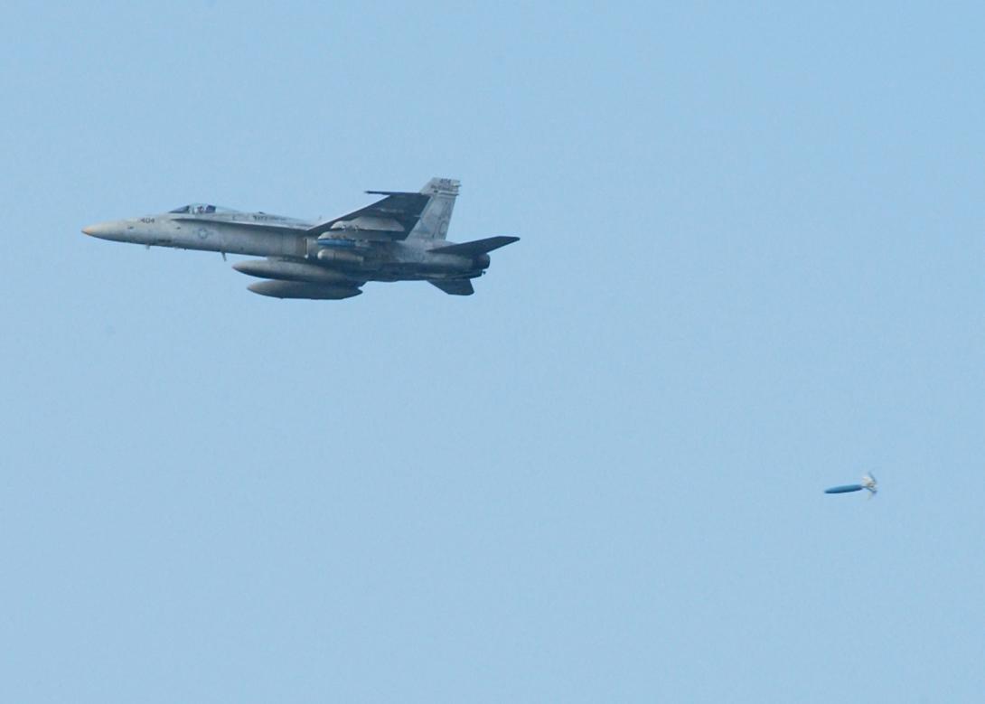 An F/A-18C Hornet drops an inert MK-82 general-purpose bomb during a training exercise. Cognitive computing technology may provide smart bombs of the future a degree of autonomy that will increase precision and limit collateral damage, including civilian casualties.