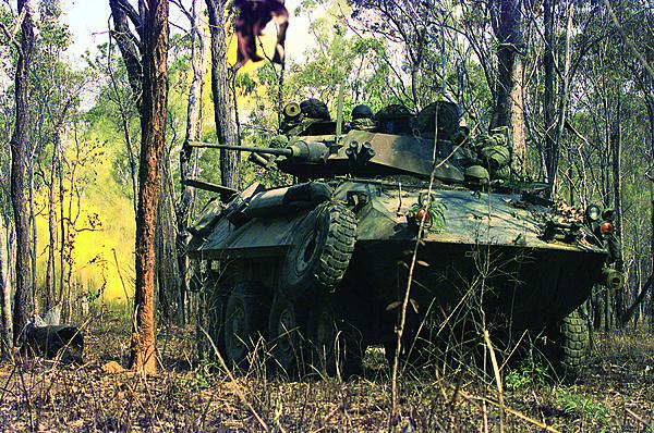 U.S. Marines from 3rd Light Armored Reconnaissance Company train the turret of their Light Armored Vehicle toward targets at the Shoalwater Bay Area Training Area in Queensland, Australia. Australia is one country in the Asia Pacific region expected to join the Coalition Interoperability Assurance and Validation working group.