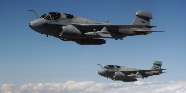 Two EA-6B Prowler electronic warfare aircraft fly over Turkey to support combined task force operations. The analog-to-digital converter chip being developed by DARPA ultimately could benefit a wide range of communications, radar and electronic warfare systems.