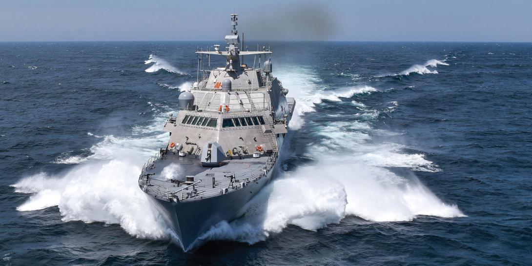 The USS Detroit (LCS 7) conducts acceptance trials, the last significant milestone before delivery to the Navy, in 2016. The Information Warfare Research Project was inspired in part by the National Shipbuilding Research Program initiated in 1971.