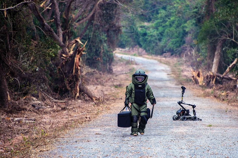 A U.S. Navy explosive ordnance disposal technician conducts counter improvised explosive device training with a robot during Cobra Gold 2016 in Thailand. Future warfighters may control robots, drones and cybersecurity systems with their brains without having neuro sensors surgically inserted. Navy photo by Petty Officer 2nd Class Daniel Rolston