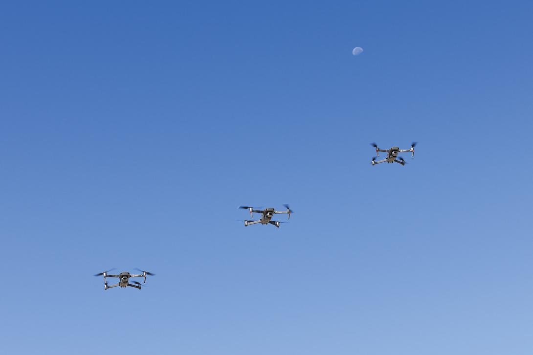 Three unmanned aerial systems fly at Edwards Air Force Base, California. Recent advances in neural implants may one day allow robots and unmanned vehicles to be operated directly from the brain. Credit: Air Force Staff Sgt. Rachel Simones