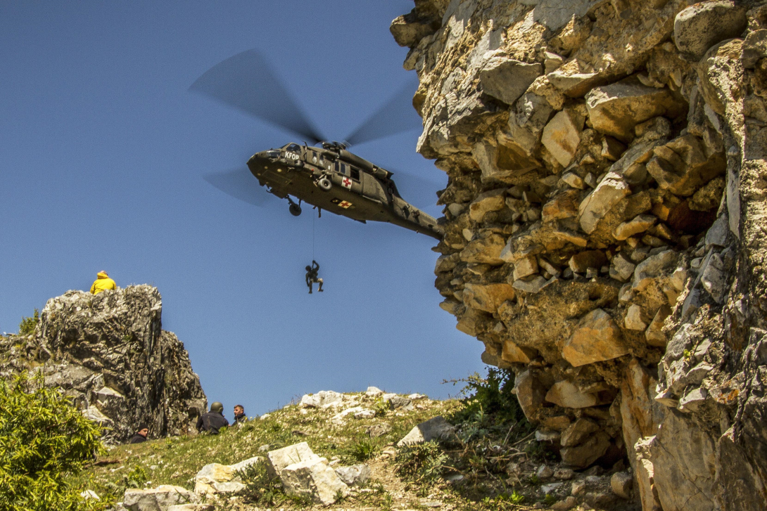 U.S. soldiers conduct live hoist rescue training with Kosovo forces in Prizren, Kosovo, April 24, 2017. The NATO Communications and Information Agency has helped develop and deploy HeliOps, a mobile app designed specifically for helicopter pilots in Kosovo.  Army photo by Spc. Adeline Witherspoon
