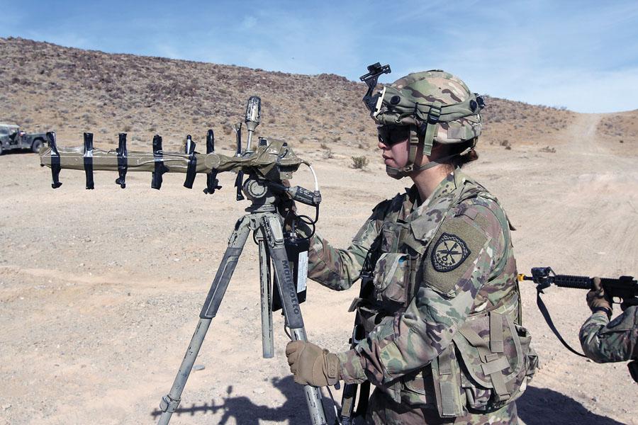 A cyber operations specialist from the Expeditionary Cyber Support Detachment, 782nd Military Intelligence Battalion (Cyber), Fort Gordon, Georgia, provides offensive cyber operations as part of the Cyber-Electromagnetic Activities (CEMA) Support to Corps and Below program during a training exercise earlier this year at the National Training Center. U.S. Army photo by Steven P. Stover (INSCOM)