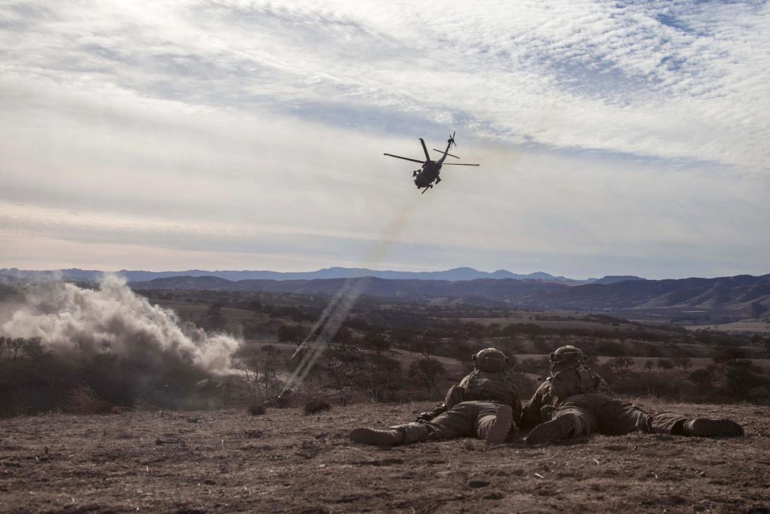 An MH-60 Black Hawk helicopter provides close air support for Rangers conducting direct-action operations during a live-fire exercise. The simulation systems used to train aviator crews as well as tank and Bradley Fighting Vehicles crews are aging and costly to sustain.