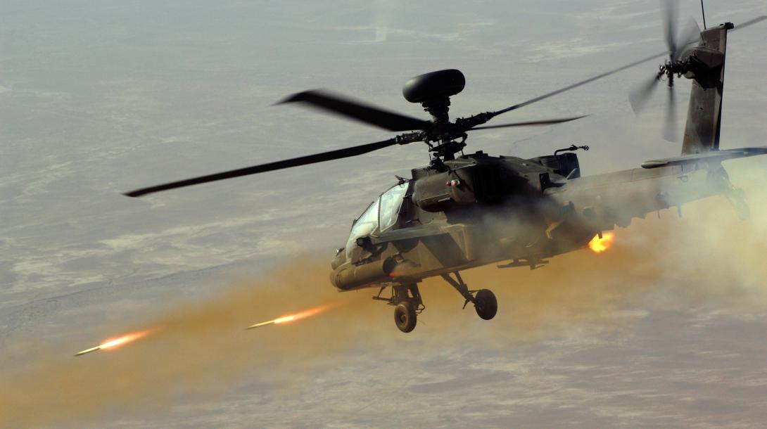 An Apache attack helicopter fires rockets at insurgents in Afghanistan. In the future, holograms and similar technologies may be used for training and educating warfighters as well as modeling weapon systems and platforms in development.