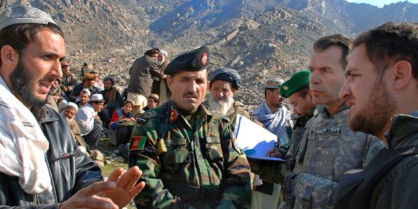 Col. Greg Julian, USA, public affairs officer for the U.S. Forces Afghanistan, leads an investigation team to meet with villagers in Tagab, Afghanistan. The team worked with the Afghan ministries of Defense and Information to explore allegations of possible civilian casualties after a mission to capture Taliban leaders. 
