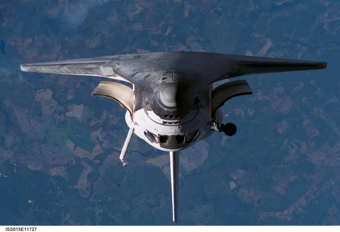The space shuttle Atlantis approaches the International Space Station. A lightweight and super-strong composite metal foam developed at North Carolina State University may have space, military, medical and commercial applications.