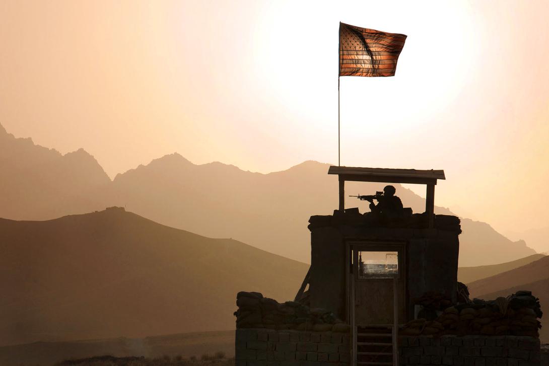 A U.S. Army specialist provides security from a tower on Forward Operating Base Lane in the Zabul province of Afghanistan. By allowing greater interoperability between military radios, the cross-banding device produced by Perkins Technical Servicess will allow soldiers at forward operating bases to more effectively tap into satellites to communicate longer distances, industry sources say.