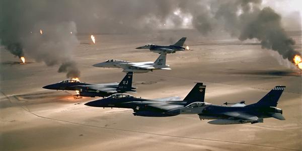 U.S. Air Force aircraft of the 4th Fighter Wing fly over Kuwaiti oil fires set by the retreating Iraqi army during Operation Desert Storm in 1991. NATO air power has not been challenged in recent conflicts, but with resources and capabilities dwindling, NATO officials are sounding warning bells about the future.