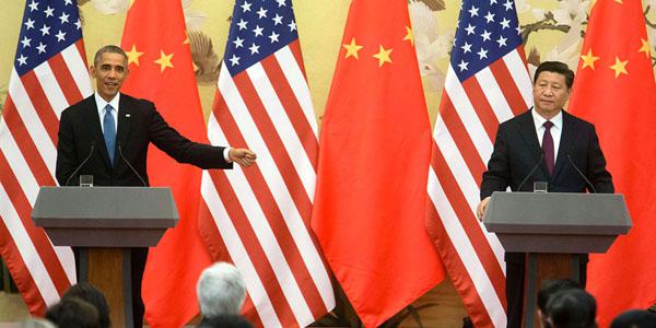 President Barack Obama and President Xi Jinping of China hold a press conference at the Great Hall of the People in Beijing, China, last year. Today, the two announced a historic agreement designed to curb cyber aggression.