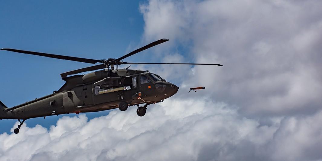 An Area-I Air-Launched, Tube-Integrated, Unmanned System, or ALTIUS, is launched from a UH-60 Black Hawk at Yuma Proving Ground, Arizona, March 4 where the U.S. Army Combat Capabilities Development Command Aviation & Missile Center led a demonstration that highlighted the forward air launch of the ALTIUS. Courtesy photo provided by Yuma Proving Ground