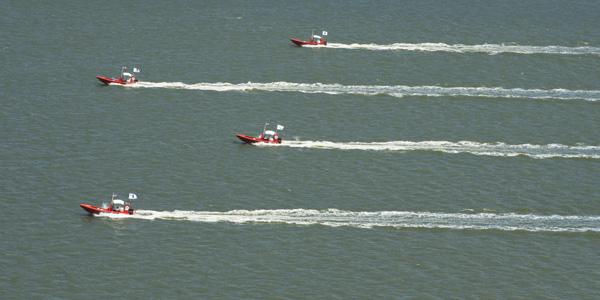 A collective of U.S. Navy unmanned systems work together to protect ships.