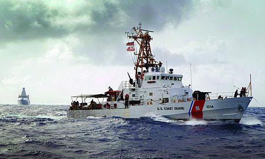 U.S. Coast Guard Cutter Sapelo and Royal Netherlands Navy Offshore Patrol Vessel HNLMS Holland search Caribbean Sea waters for bales of contraband. SeaWatch is the Coast Guard’s next-generation command and control system for cutters.