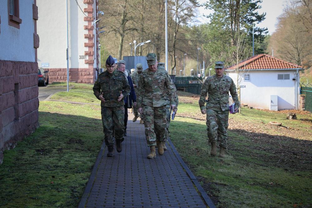 NATO’s new Joint Support and Enabling Command (JSEC) will assist troops deploying to Europe to make movement quicker and easier, says Lt. Gen. Jürgen Knappe, GEAF, JSEC commander and commanding general of the Multinational Joint Headquarters, Ulm (l), speaking with Maj. Gen. Chris Mohan, USA, 21st Theater Sustainment Command, during a visit to the Panzer Kaserne in Kaiserslautern, Germany, in March.  U.S. Army photo by Pfc. Katelyn Myers.