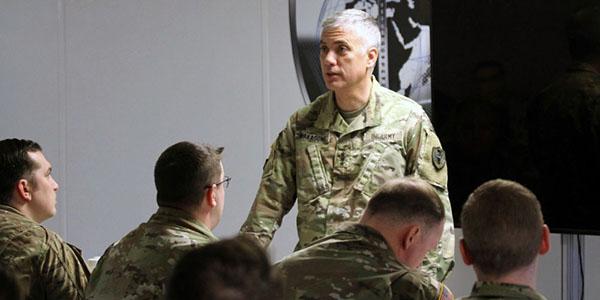 Gen. Paul Nakasone, USA, commander, U.S. Cyber Command; director, National Security Agency; and chief, Central Security Service, pictured speaking in 2019 with cyber soldiers assigned Fort Meade, expects an increase in the number of cyber teams deployed at the request of foreign governments to help defend against cyber marauders. Credit: Steven Stover, 780th Military Intelligence Brigade (Cyber)