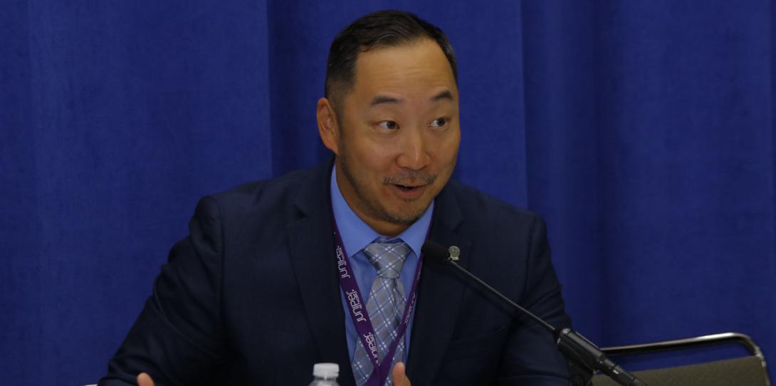 Dr. Andrew Heo, chief cybersecurity engineer, ITS LLC, speaks during a STEM panel att DCOS.