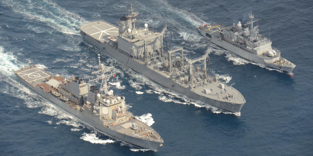 The USS Wilbur (l) conducts replenishment at sea with Japanese and French ships. The U.S. Indo-Pacific Command is expanding its exercise and training activities with allies and partners to boost its deterrent capabilities across the vast region.  U.S. Navy courtesy of Japan Maritime Self-Defense Force