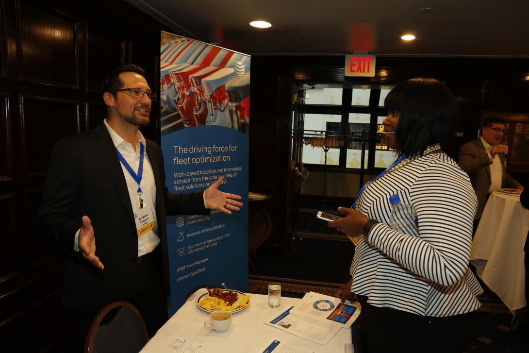 Attendees of AFCEA DC Chapter's IoT Summit on Tuesday get to network and visit with exhibitors. Photo by Mike Carpenter