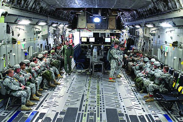 The full Joint Airborne Command and Control/Command Post (JACC/CP) system, which consists of four pallets with seats and work stations for as many as 16 users, sits in the cargo hold of a C-17 with soldiers deploying to a distant operation. Unlike the C-130, both ground troops (paratroopers) and battle staff can occupy the aircraft simultaneously with the JACC/CP.
