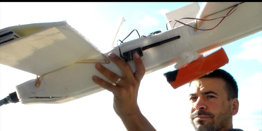 Maj. Mark Jacobsen, USAF, tests an unmanned aerial vehicle as part of the Syria Airlift Project, which he hopes one day will use drones to deliver food and medicine to war-torn countries.
