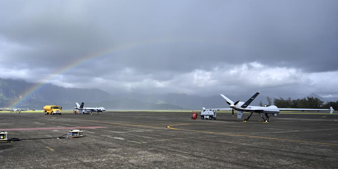 Two MQ-9 Reapers are parked on the flight line during the Air Force’s Exercise Agile Combat Employment Reaper on September 20, 2021, on Marine Corps Base Hawaii, Hawaii. Reapers joined on MCB Hawaii from multiple bases across the continental United States for the exercise. Experts purport that cutting the MQ-9 Reaper program would harm U.S. capabilities and ability to protect itself. Credit: U.S. Air Force photo by Airman 1st Class Adrian Salazar