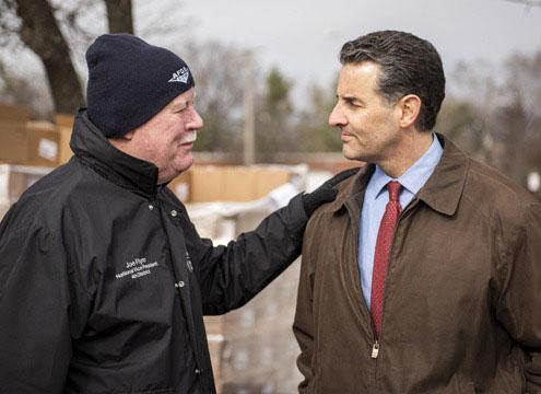 Rep. Paul Sarbanes (D-MD) (r) speaks with Joe Flynn of the American Federation of Government Employees about how the shutdown is affecting his organization’s members