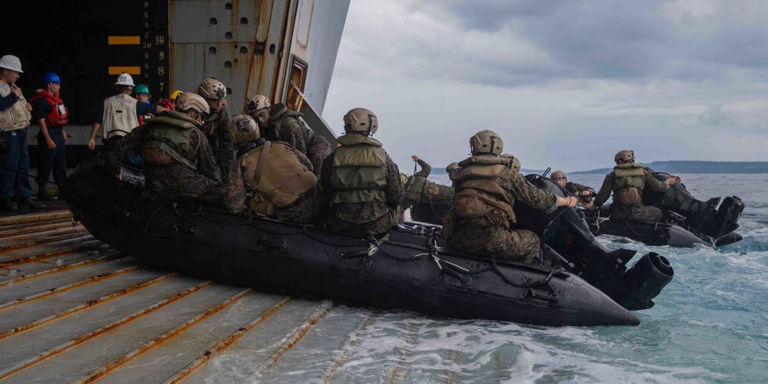 Marines and sailors aboard the amphibious assault ship USS New Orleans execute small boat drills in the Philippine Sea. Greater integration between the Navy and Marine Corps is leading to more joint operations in support of maritime security. Credit: Lance Cpl. Grace Gerlach, USMC