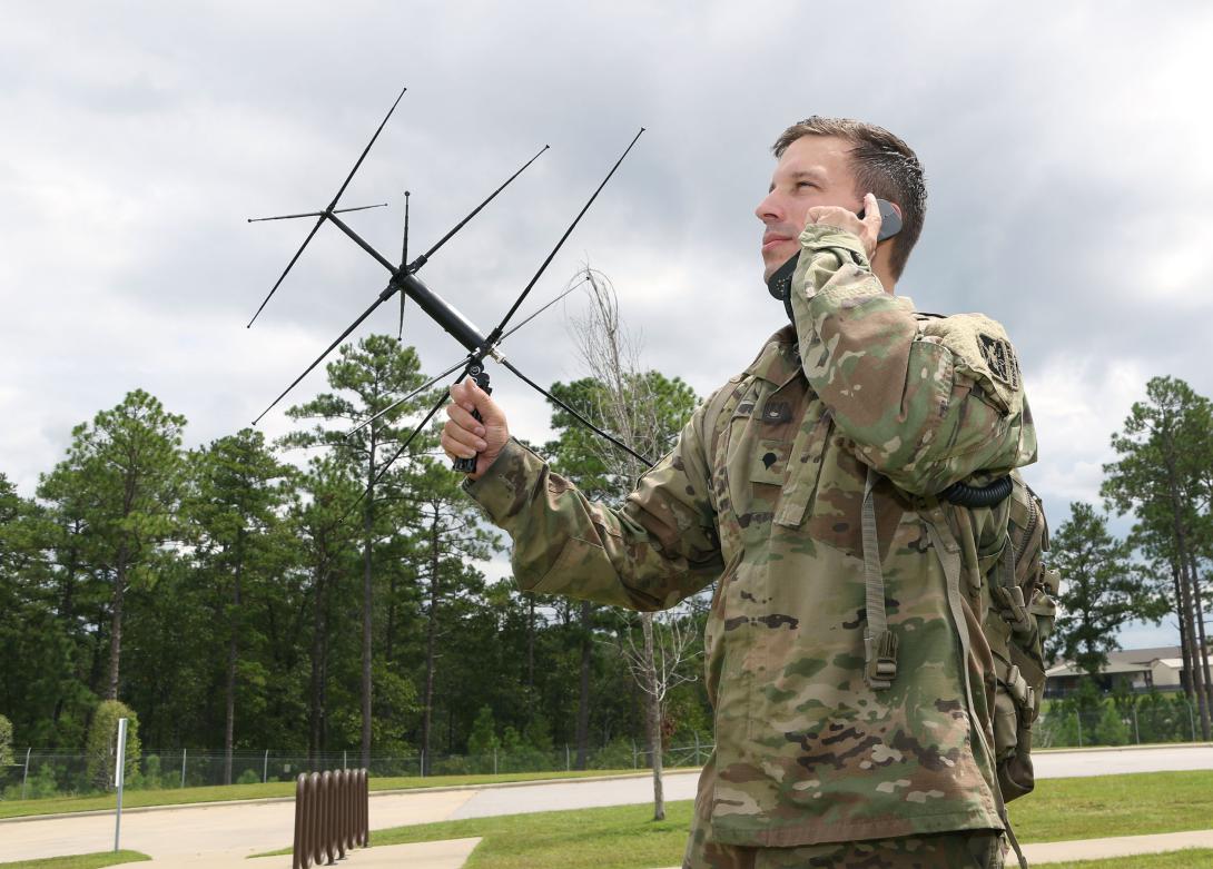 A student assigned to the U.S. Army John F. Kennedy Special Warfare Center and School, who is in the Special Forces Communications Sergeant course, uses an AV-2125 satellite antenna with an AN/PRC-117G satellite radio during training at the Yarborough Training Complex at Fort Bragg, North Carolina. Once qualified, students in the satellite communications module will be proficient in installing, operating and maintaining satellite communications links.  U.S. Army photo by K. Kassens