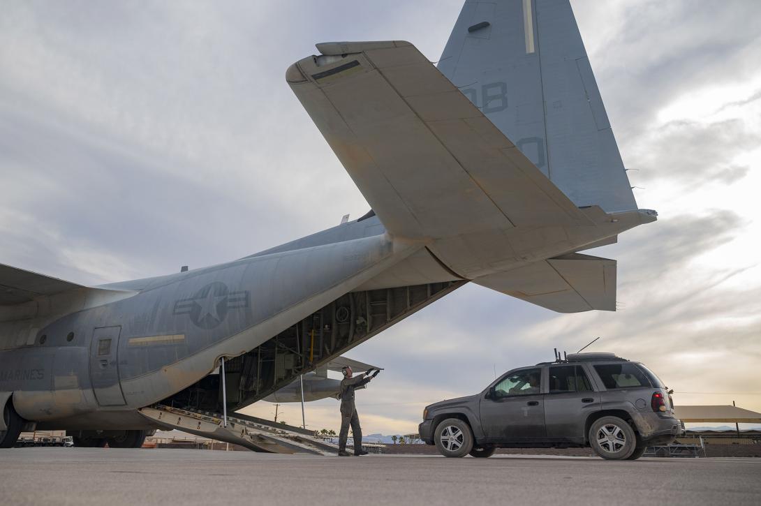 U.S. Marines and their KC-130 aircraft paired with a Chevrolet SUV equipped with commercial and government off-the-shelf components to achieve operation of the first-ever truly mobile command and control capabilities, during the Black Flag 22-1 exercise at the base’s Nevada Test and Training Range on May 12, reported Senior Airman Zachary Rufus from the 57th Wing Public Affairs Office. Credit: Senior Airman Zachary Rufus