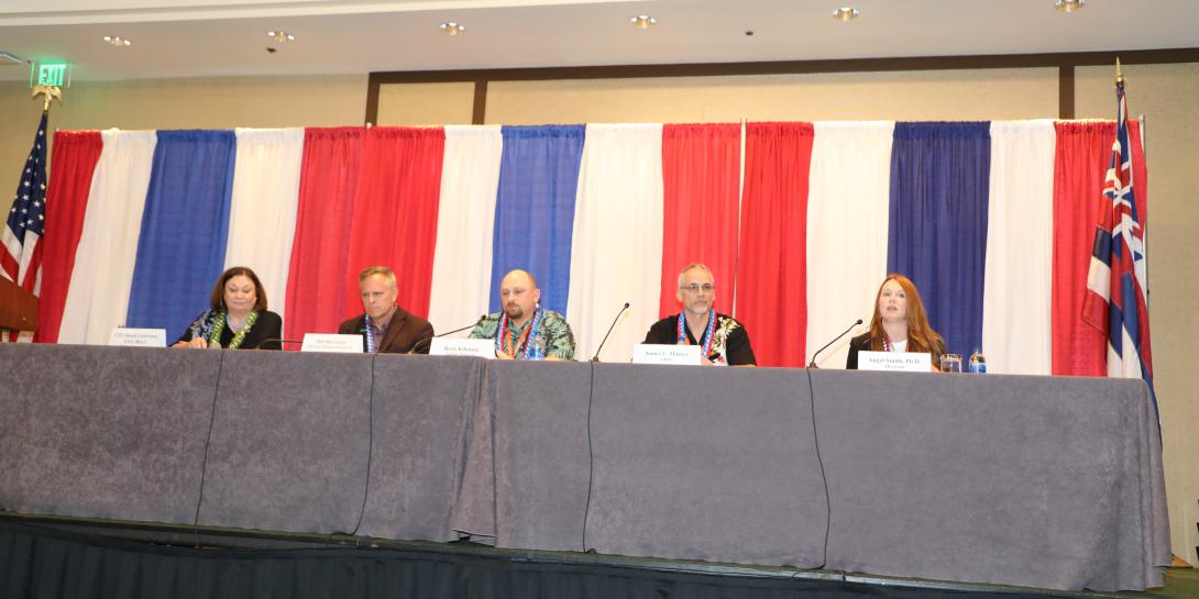 Panelists discussing cloud computing at TechNet Indo-Pacific are (l-r) moderator Lt. Gen. Susan Lawrence, USA (Ret.), AFCEA president and CEO; Bill Burnham, Hewlett Packard Enterprise; Boris Kilimnik, Juniper Networks; James T. Matney, GDIT; and Angel Smith, Microsoft. Credit: Dave Livingston photo