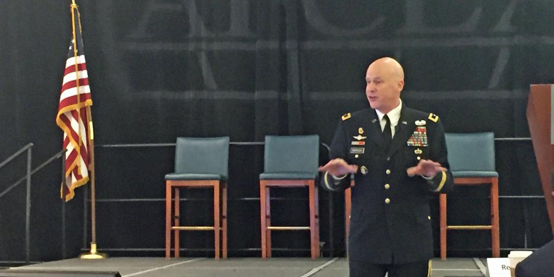 Major Gen. John B. Morrison, USA, commanding general, U.S. Cyber Center of Excellence and Fort Gordon, offers welcoming remarks at AFCEA's first Cyber Education, Research and Training Symposium. 