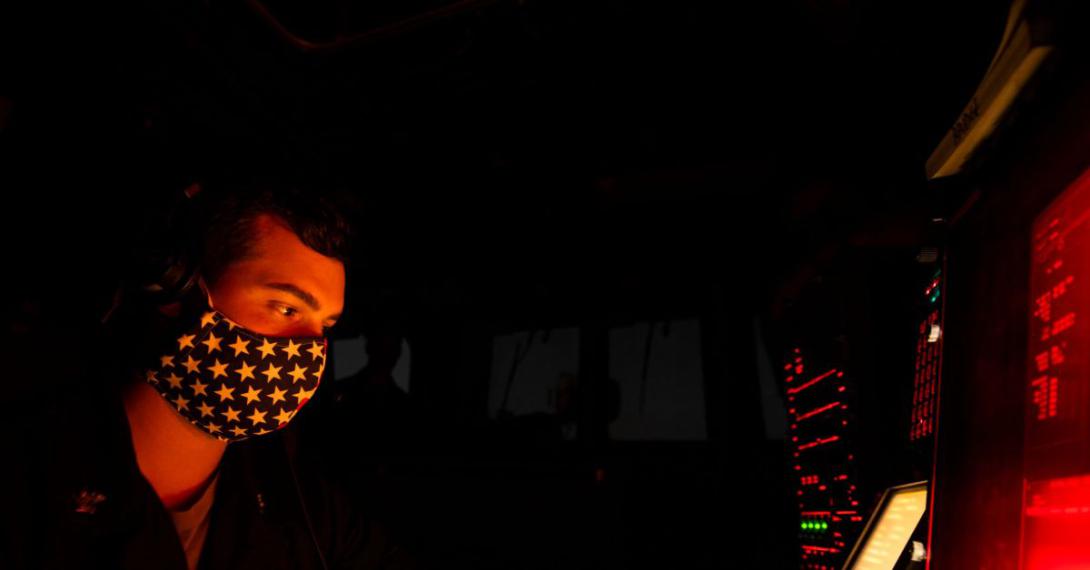 A U.S. Navy operations specialist communicates with bridge wing watchstanders aboard the Arleigh Burke-class guided missile destroyer USS Sterett. The Navy is moving full speed ahead on its modernization efforts, but it needs more rapid insertion of information technologies into the fleet and ashore.  U.S. Navy photo