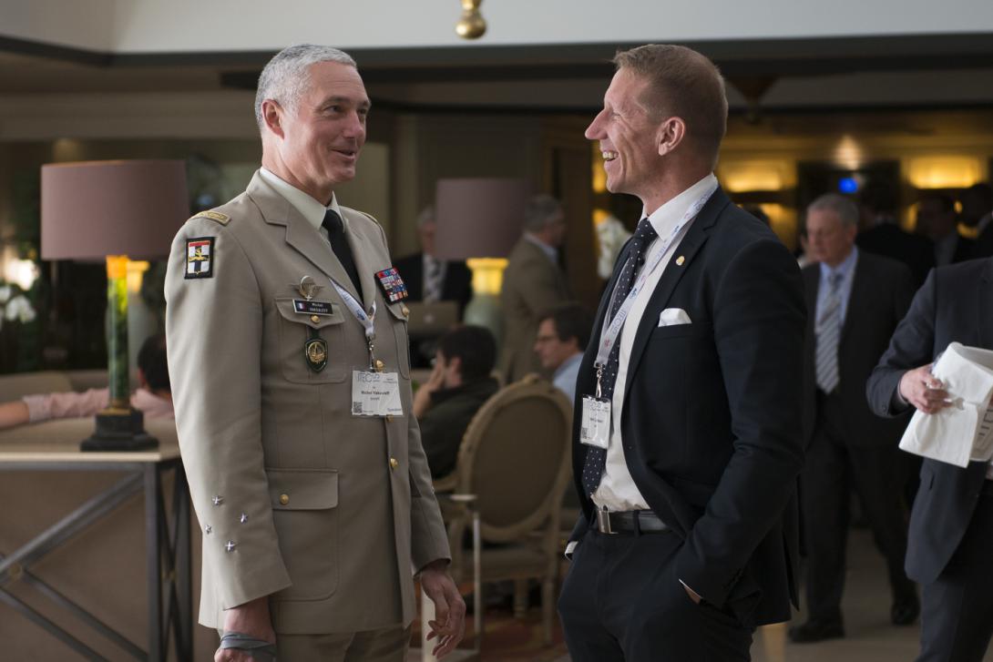 Lt. Gen. Michel Yakovleff, FRA (l), vice chief of staff, Allied Command Operations, Supreme Headquarters Allied Powers Europe, and Harri Larsson, AFCEA regional vice president for the Nordic Region, exchange ideas during an event break at NITEC 2015.