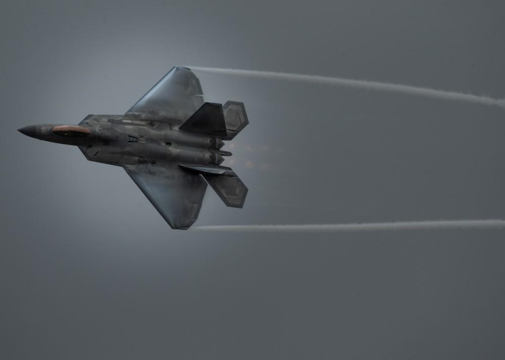 The Air Combat Command is on its way to being the U.S. Air Force's "lead command for cyberspace superiority" while it maintains its more traditional role of providing air combat forces and capabilities, such as this F-22 aircraft, flown by U.S. Air Force Maj. Joshua "Cabo" Gunderson, F-22 Raptor Demonstration Team commander and pilot, during the 2020 Stuart Air Show on November 7, in Stuart, Florida. U.S. Air Force photo by Capt. Kip Sumner