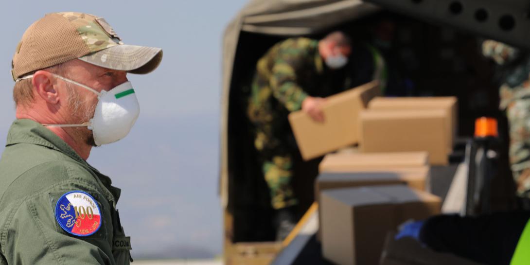 Czech military personnel load PPE supplies. Military personnel are conducting widespread testing in the Czech system of Smart Quarantine. Photo courtesy of NATO