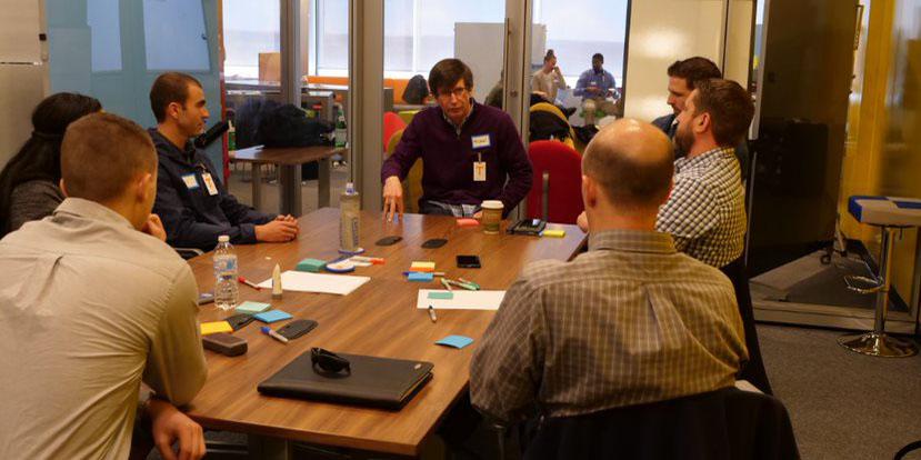 U.S Air Force Academy cadets work with industry participants during a CyberWorx design project. 
