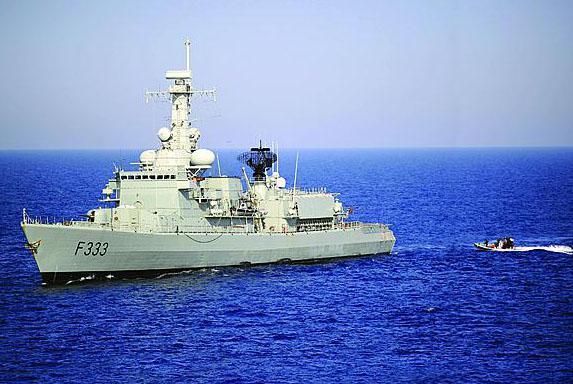 The Portuguese navy frigate NRP Bartolomeu Dias stands by to receive its visit, board, search and seizure crew returning aboard a rigid-hull inflatable boat during an exercise in the Mediterranean Sea. Portugal’s navy, which has been participating in a variety of coalition counterpiracy operations, soon may find itself tasked with vastly greater missions even as it confronts severe budget limitations.