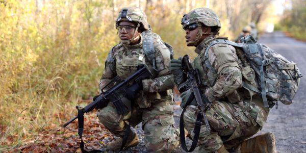 Soldiers with the 10th Mountain Division, Fort Drum, New York, survey an obstacle during an evaluation of the modular scalable vest generation II. The U.S. Army’s Army Research Laboratory (ARL) is working on developing personal and vehicle protective gear using new materials for harsh combat conditions. ARL photo