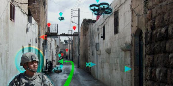 A U.S. Army soldier patrols an urban area in this artist’s concept showing aerial and ground unmanned vehicles supporting his mission as a team. The Army Research Laboratory has established a real-world testbed at Graces Quarters, Maryland, in which autonomous vehicles can be put through their paces in woods, fields, marshes and urban areas to explore similar scenarios.  ARL image