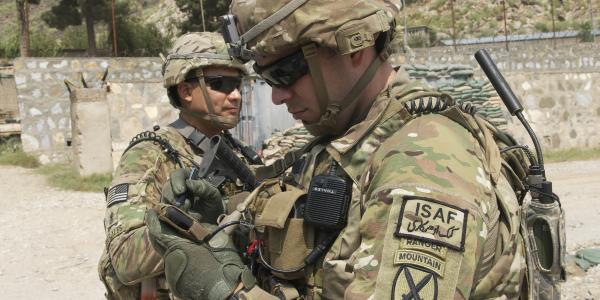 A U.S. Army captain uses a Nett Warrior end-user device in Afghanistan. A new approach to network training aims to teach soldiers what they need to know at their home station before deployment. 