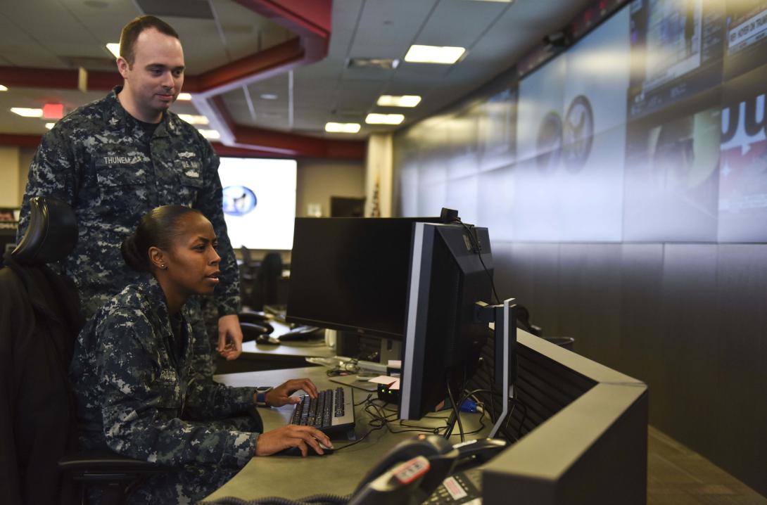 Two U.S. Navy sailors stand watch over systems at the Navy’s Fleet Cyber Command. Congress has granted a new Cyber Excepted Service hiring practice that benefits DISA in its efforts to improve cybersecurity across the Defense Department.