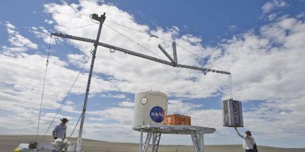 The Lightweight Surface Manipulator System (LSMS), a surface version of TALISMAN, would help offload lunar landers and construct facilities on the Moon.  NASA