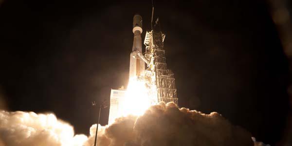 A United Launch Alliance Atlas V launches a National Reconnaissance Office (NRO) payload, NROL-35, last December. The NRO is focusing on its ground architecture to upgrade the capabilities of its orbital assets amid tight budgets and a changing threat picture. Betty J. Sapp is the director of the National Reconnaissance Office.